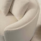 Ivory Boucle Curved Modular Sectional Sofa with Chaise & Toss Pillows | Modern 2-Piece Sectional close-up view showing plush texture and curved design.
