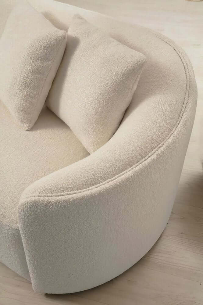 Ivory Boucle Curved Modular Sectional Sofa with Chaise & Toss Pillows | Modern 2-Piece Sectional close-up view showing plush texture and curved design.