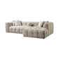 Ivory Boucle L Shaped Two Piece Sofa and Chaise Sectional With Toss Pillows in a cozy living room setting.