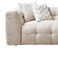 Ivory Boucle L Shaped Two Piece Sofa and Chaise Sectional With Toss Pillows close-up view featuring soft upholstery