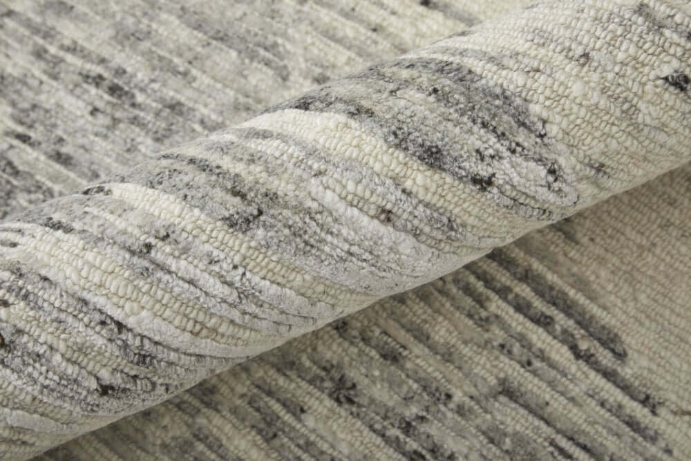 9' X 13' Ivory and Gray Abstract Hand Knotted Worn Faded Area Rug texture close-up showing design details.