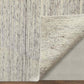9' X 13' Ivory And Gray Abstract Hand Knotted Distressed Area Rug showcasing its detailed texture and backing.