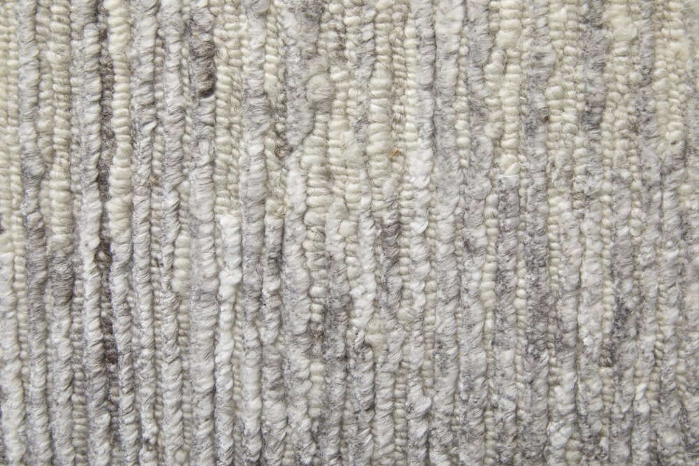 9' X 13' Ivory And Gray Abstract Hand Knotted Distressed Area Rug texture close-up.