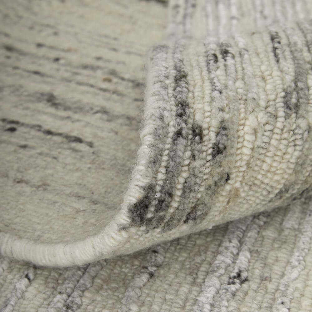 9' X 13' Ivory and Gray Abstract Hand Knotted Worn Faded Area Rug detail showing texture and design
