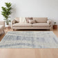 Ivory Gray and Blue Abstract Hand Knotted Worn Faded Area Rug | 9' x 13' in a modern living room setting.