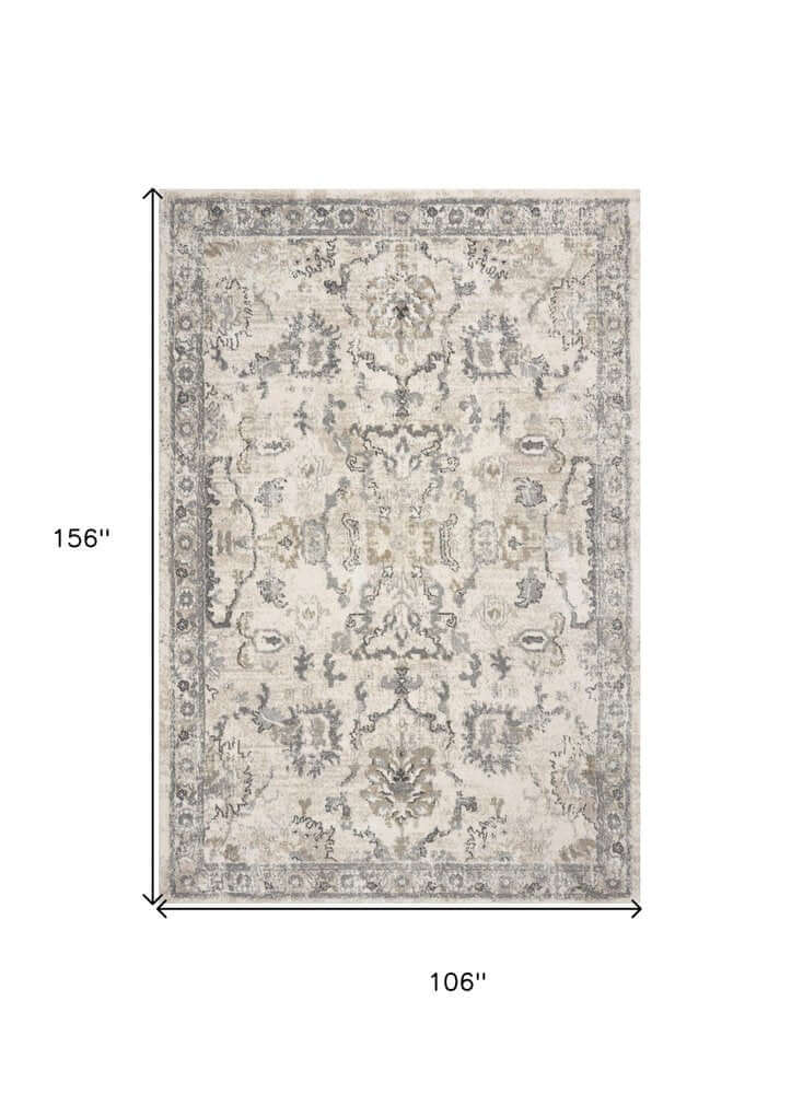 Ivory And Gray Floral Medallion Distressed Area Rug | 9' x 13'. Soft floral pattern with a distressed finish.