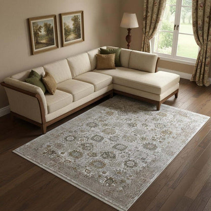 Ivory Gray And Gold Floral Area Rug With Fringe Area Rug | 9' x 13' displayed in a cozy living room setting.