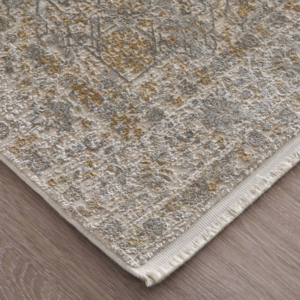 Ivory Gray And Gold Oriental Area Rug With Fringe Area Rug | 9' x 13' showcasing rich textures and classic patterns.