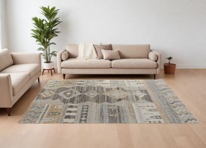 Ivory Gray and Orange Wool Moroccan Hand Knotted Area Rug | 9' x 13' showcased in a modern living room setting.