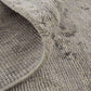 Ivory And Gray Wool Abstract Hand Knotted Area Rug | 9' x 13' with a textured surface and rolled edge.