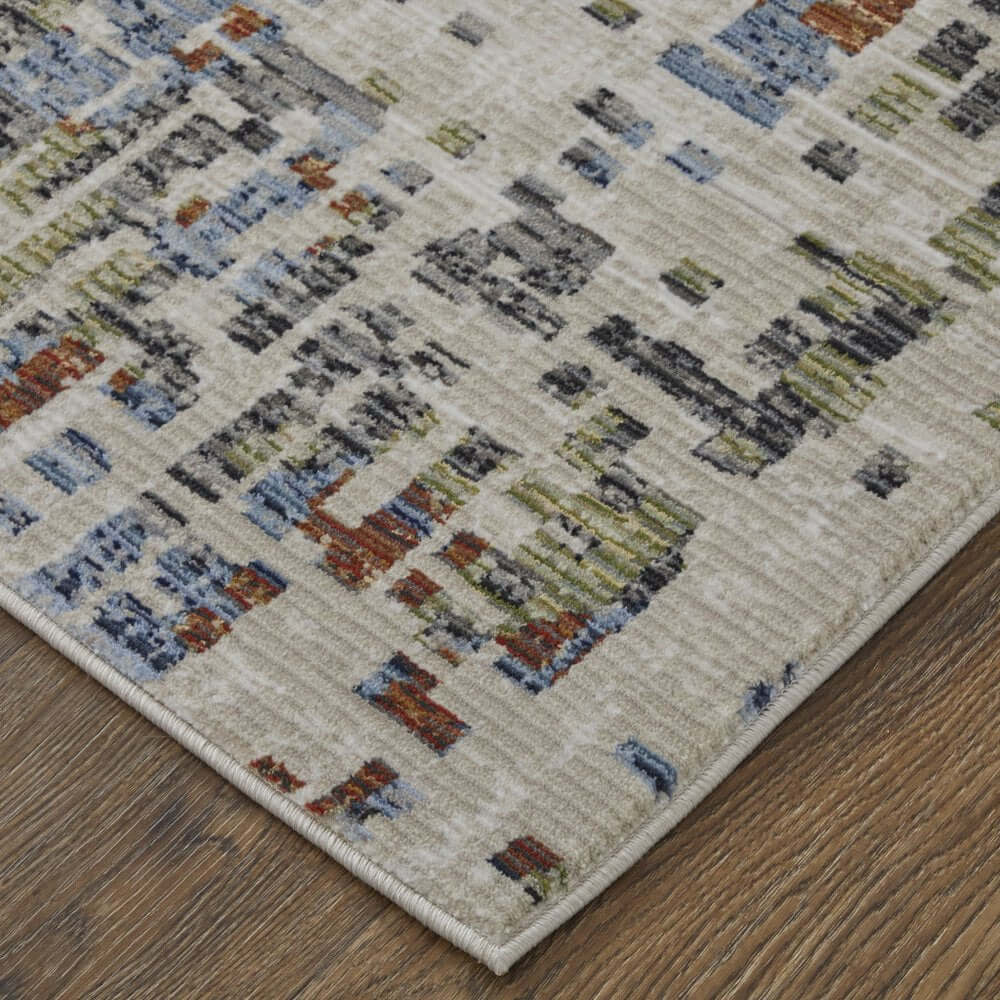 Ivory Green and Blue Abstract Power Loom Area Rug | 9' x 13' close-up view highlighting its design and texture.