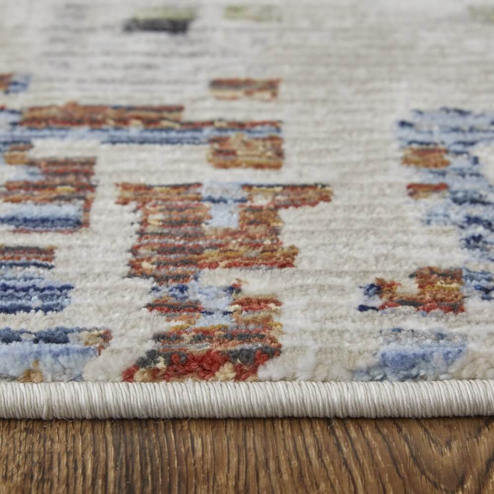 Ivory Green and Blue Abstract Power Loom Area Rug | 9' x 13' close-up view, highlighting texture and colors.