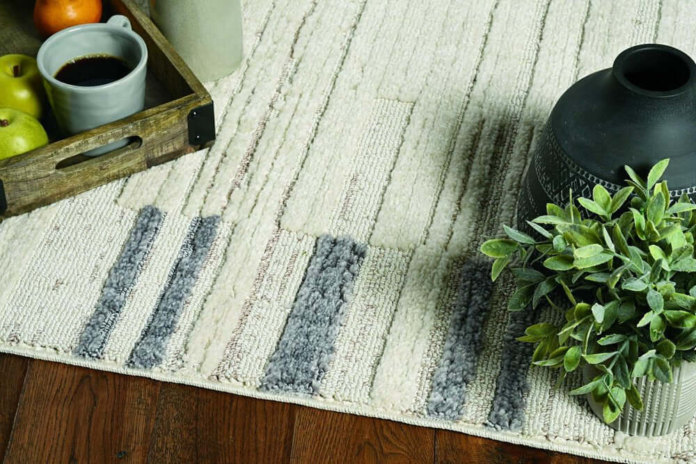 Ivory Grey Machine Woven Abstract Color Block Indoor Area Rug | 9' x 13' with grey and ivory stripes, enhancing home decor.