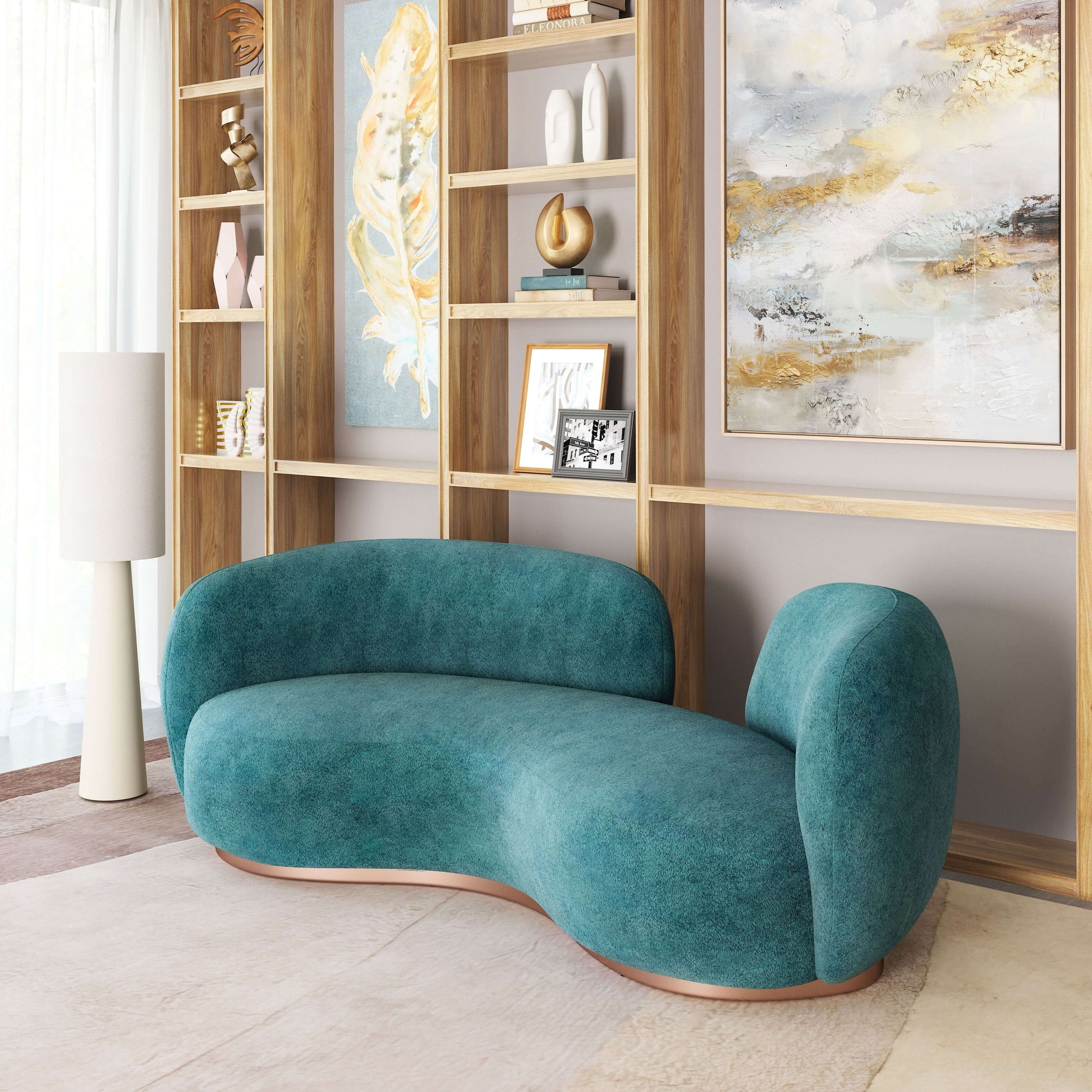 Jamela Teal Curved Sofa in shearling-style fabric, modern design with brass base in a stylish living room.