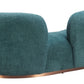 Jamela Teal curved sofa with shearling-style fabric and brass base, modern and stylish with soft texture.
