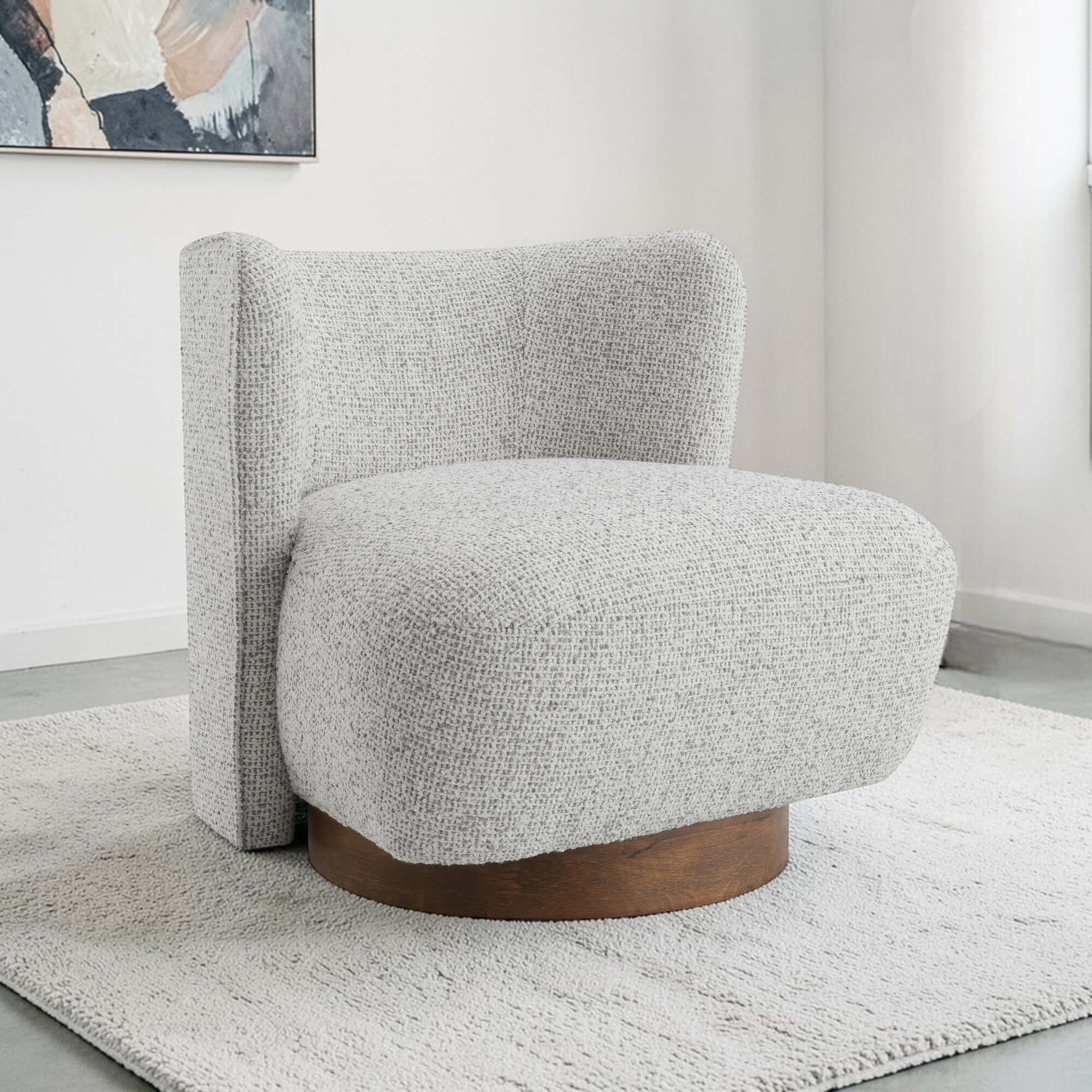 Lisa Gray Tweed Accent Chair in gray tweed fabric with round wooden base, ideal for modern and transitional interiors.