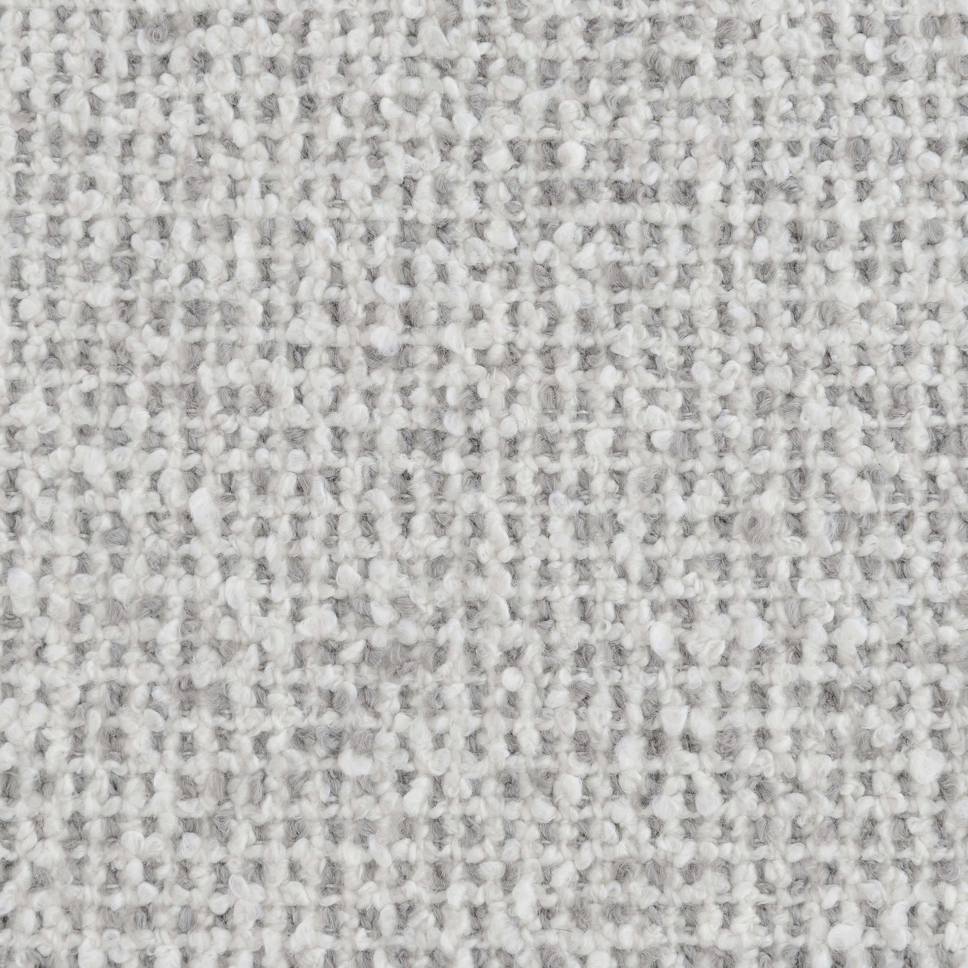Close-up of the gray tweed fabric used in the Lisa Gray Tweed Accent Chair, showcasing texture and color.