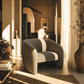 Livia Brown & Gray Tweed Accent Chair in a stylish sunlit living room with modern decor.