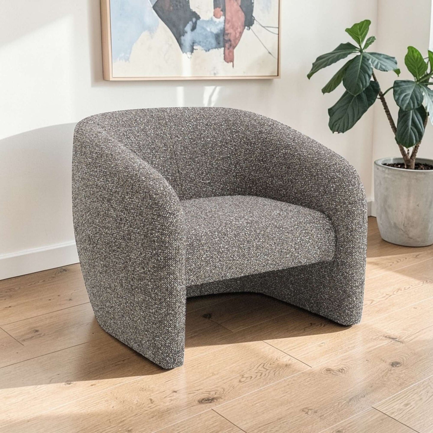 Livia Brown & Gray Tweed Accent Chair in modern living space with natural light and decorative plants.