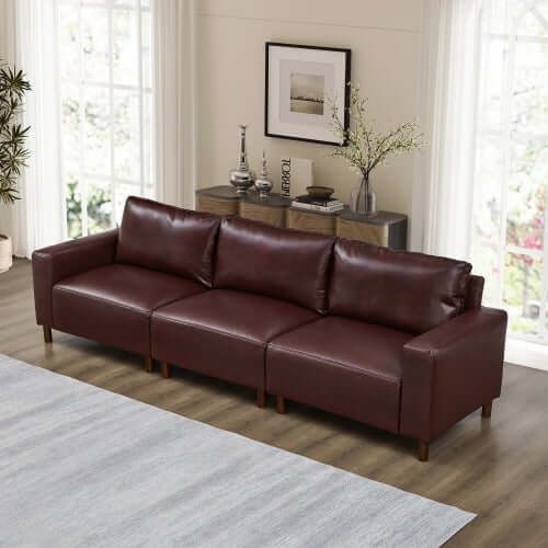 Luxury PU Leather Sofa 112" – Modern Faux Leather 3-Seat Couch with Wood Legs (3 Colors) in rich brown color.