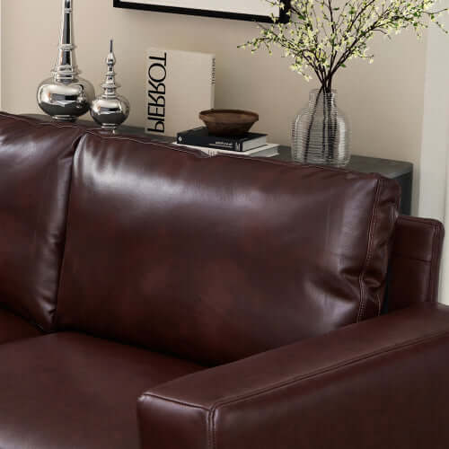 Luxury PU Leather Sofa 112" – Modern Faux Leather 3-Seat Couch with Wood Legs (3 Colors) with rich brown upholstery.