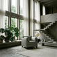 Matias Gray Premium Italian Leather Armchair in a stylish modern living room with large windows.