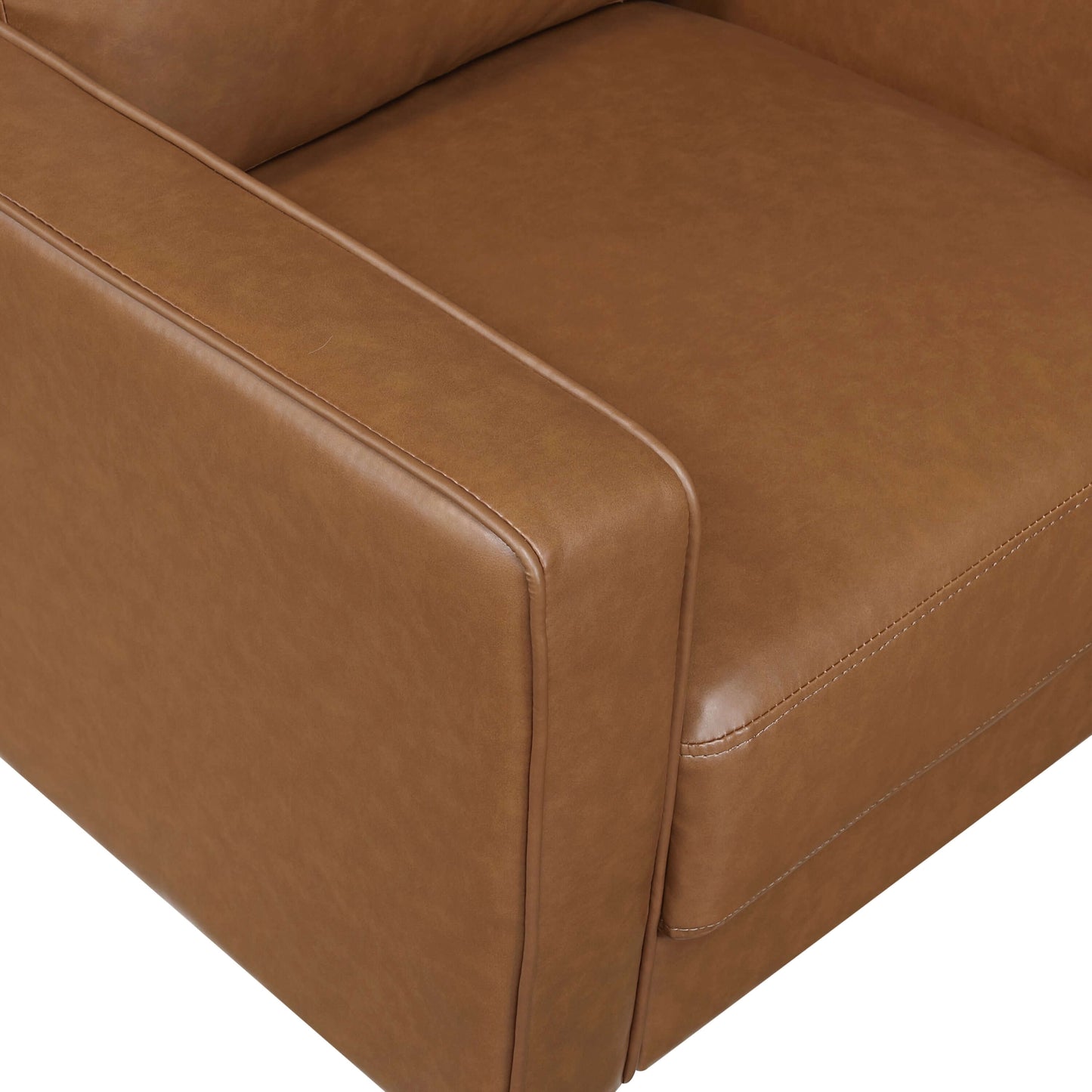 Close-up view of the MCM Brown Faux Leather Armchair – Modern Upholstered Accent Chair showcasing rich faux leather.