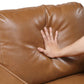 MCM Brown Faux Leather Loveseat 54" – Modern Compact 2-Seat Sofa cushion being pressed for comfort