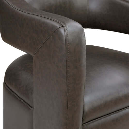 MCM Faux Leather Swivel Chair – Modern Barrel Accent Chair (2 Colors) showcasing a detailed close-up of the stylish armrest.
