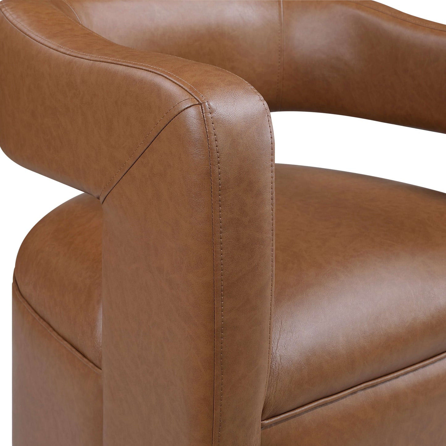 MCM Faux Leather Swivel Chair – Modern Barrel Accent Chair (2 Colors) close-up of camel-tone faux leather and arm.