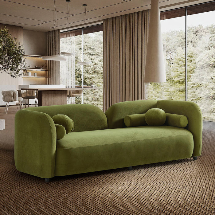 Minimalist Curved Boucle Sofa 93” – Donna Modern Sculptural Couch (3 Colors) in a stylish green fabric setting.