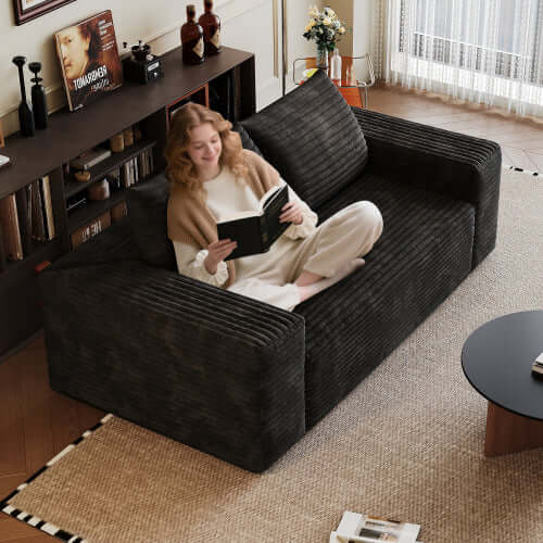 Modern Corduroy Deep Seat Loveseat Sofa – Comfy Couch (4 Colors and 3 Sizes) with a woman reading.