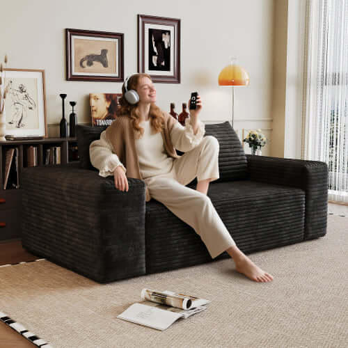 Modern Corduroy Deep Seat Loveseat Sofa – Comfy Couch (4 Colors and 3 Sizes) with woman relaxing at home.