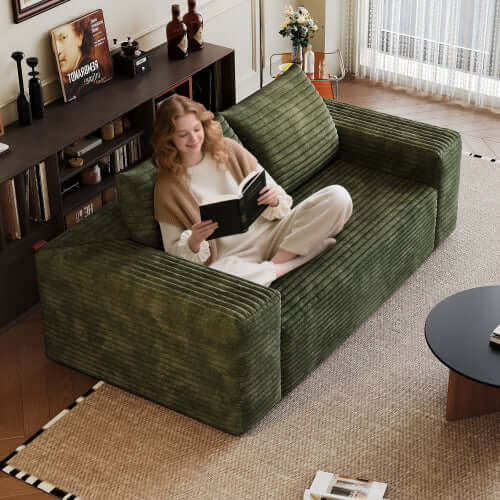 Modern Corduroy Deep Seat Loveseat Sofa – Comfy Couch (4 Colors and 3 Sizes) with a woman reading in a cozy living room