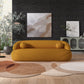 Modern Curved Boucle Sofa 84” (3 Colors) – Andrew Minimalist Sculptural Couch in a contemporary living room setting.