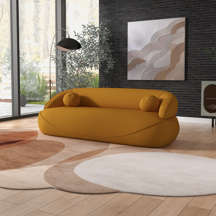 Modern Curved Boucle Sofa 84” (3 Colors) – Andrew Minimalist Sculptural Couch in a cozy living room setting.