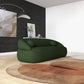 Modern Curved Boucle Sofa 84” (3 Colors) – Andrew Minimalist Sculptural Couch in green with chic decor.