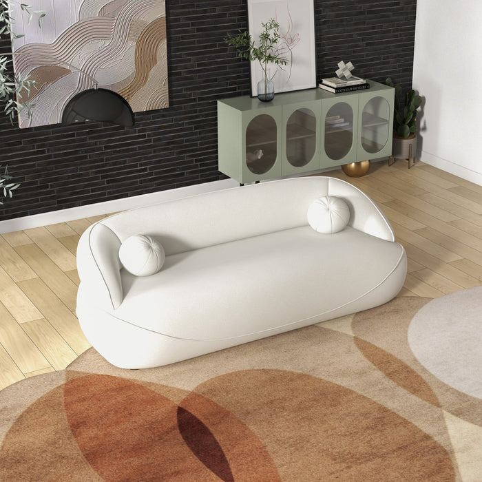Modern Curved Boucle Sofa 84” (3 Colors) – Andrew Minimalist Sculptural Couch in a stylish living room setting.