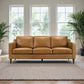 Modern Genuine Leather 3 Seat Sofa 81” – Cooper MCM Tan Leather Couch in a bright living room with large windows.