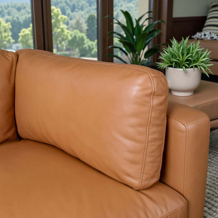 Close-up of the Bellrose MCM Genuine Leather Sofa 93W showcasing its premium tan leather upholstery and modern design.