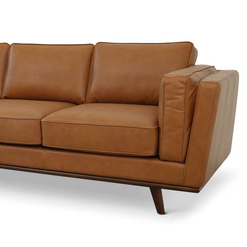 The Ashcroft Furniture Chase MCM Genuine Leather Sofa 91 features angled wooden legs and thick, cushioned seats and backrests. Displayed from a side and partial front view against a white background.