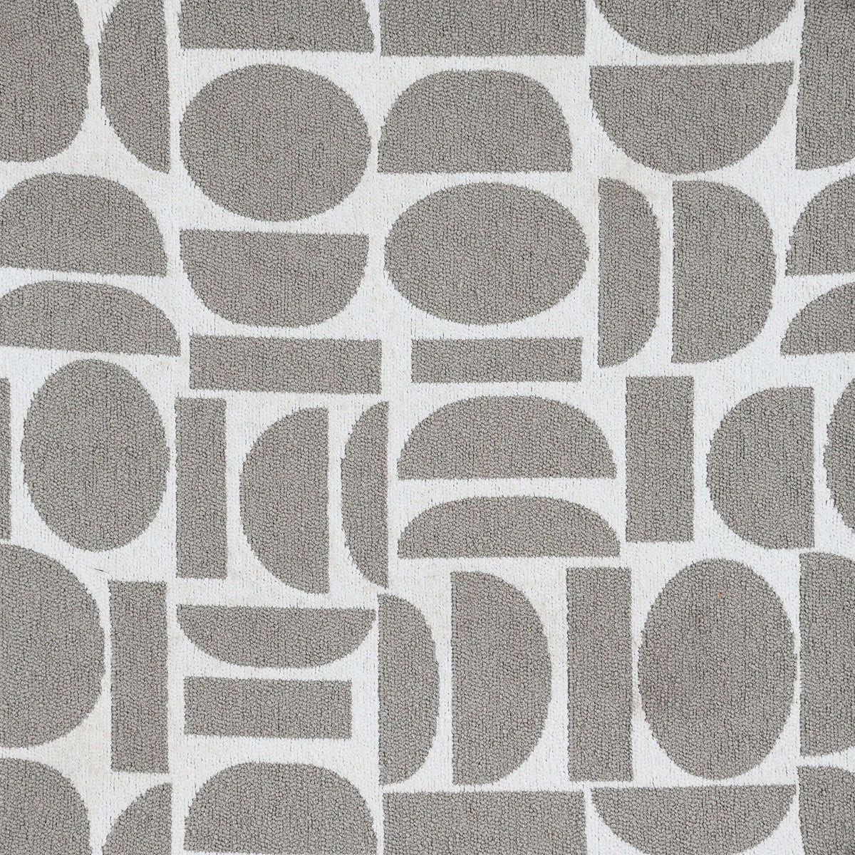 Geometric gray and white patterned fabric suitable for upholstery or home decor.