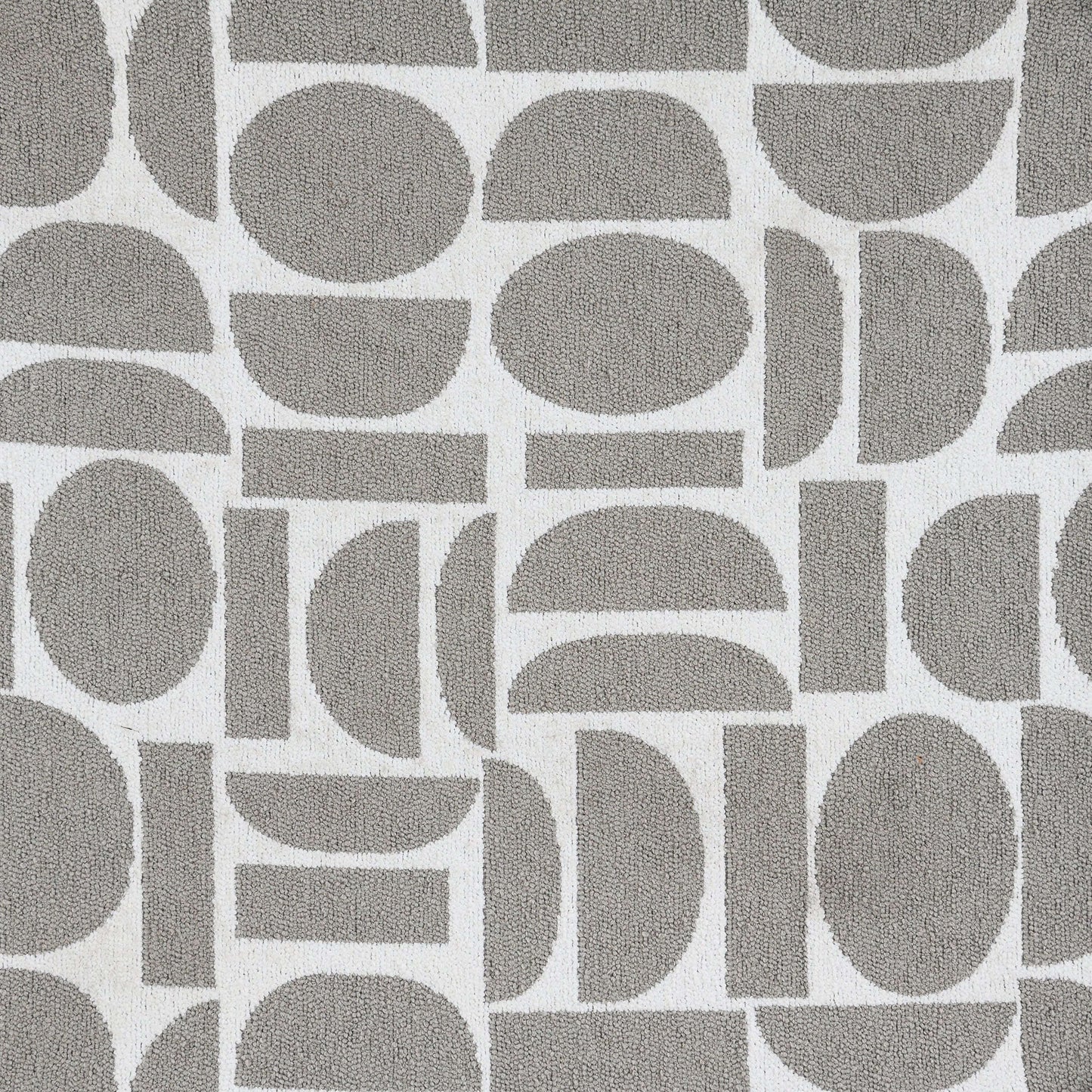Geometric gray and white patterned fabric suitable for upholstery or home decor.