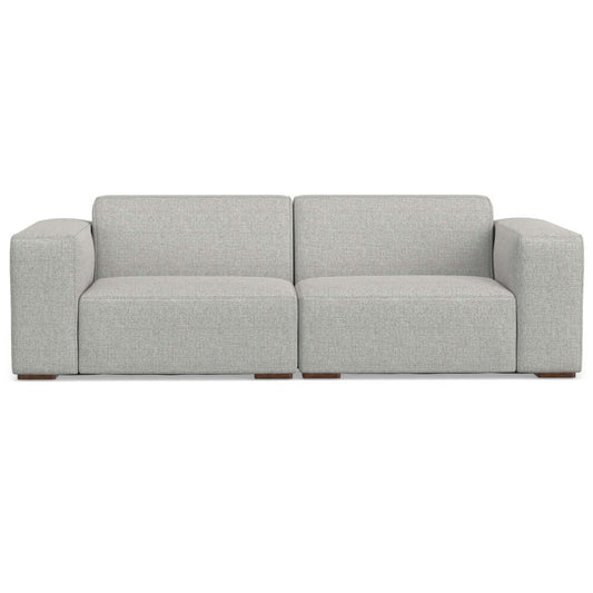 Contemporary Boxy Silhoette Sofa (2 Sizes) in light gray fabric, featuring wide armrests and a sleek design.