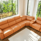 Modern Modular Leather Reclining Sectional Sofa – 6 Piece Couch with Cup Holders (Seats 5) in a bright living room.
