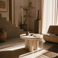 Joane Light Gray High Gloss End Table 24" in a stylish living room with natural light and contemporary decor.