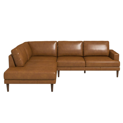 The Ashcroft Furniture Corbin MCM Tan Leather Sectional Chaise Sofa 108 features three seat cushions, a left-side chaise, and mid-century modern wooden legs, all shown against a white background.