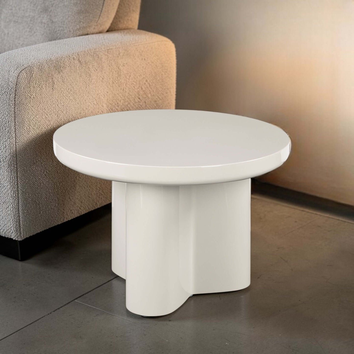 Joane Light Gray High Gloss End Table 24"W stylishly placed next to a cozy sofa in a modern living room.