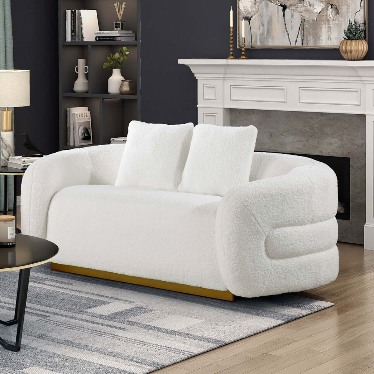 Novella Sherpa Loveseat – 71” white sherpa loveseat with plush cushions and gold base in a modern living room.