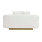 White sherpa loveseat with a gold base, featuring soft cushions and a modern design for stylish comfort.